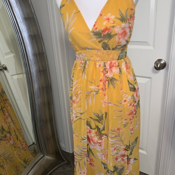 Revamped Dresses & Skirts - 5/$25!! Yellow Floral Flowy Dress w/ deep V and Open Back